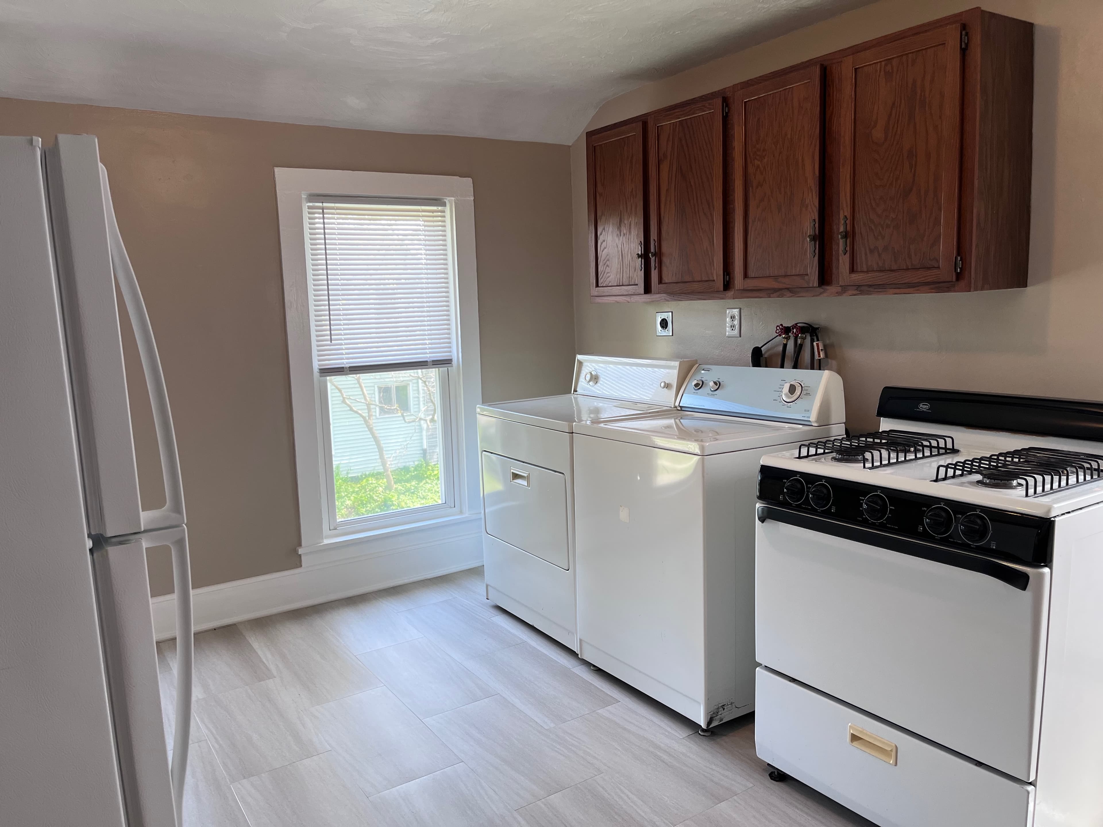 A well-maintained rental home with a covered porch